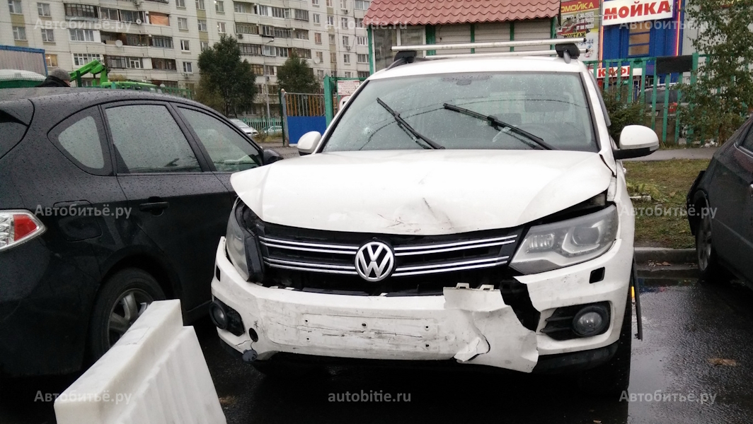 Volkswagen Tiguan I - битый спереди.